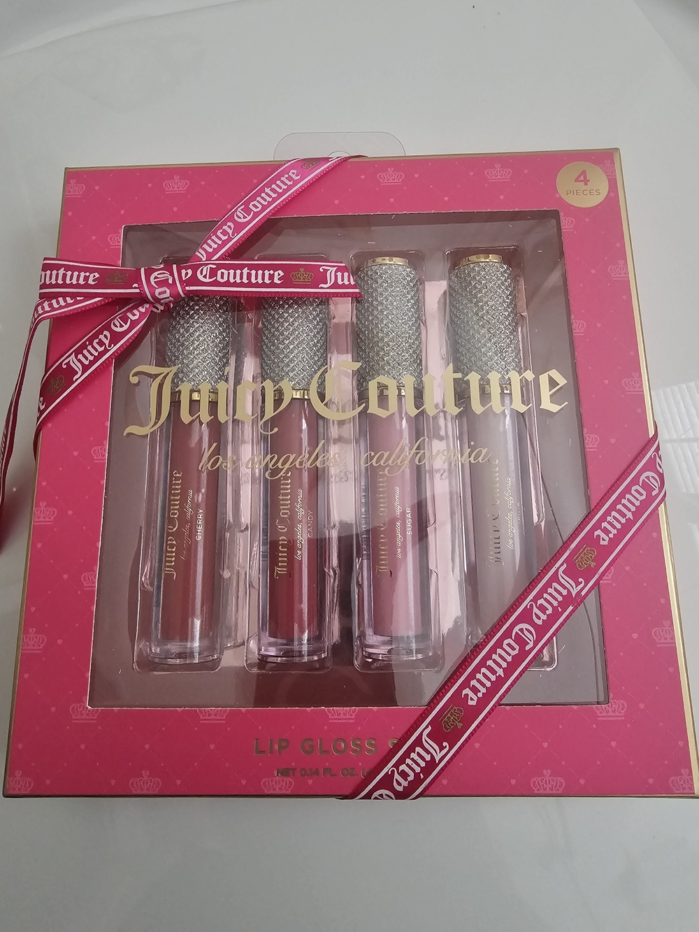 Juicy Couture 4-Piece Lip Gloss Set - Pink, Rose, Nude, Mauve